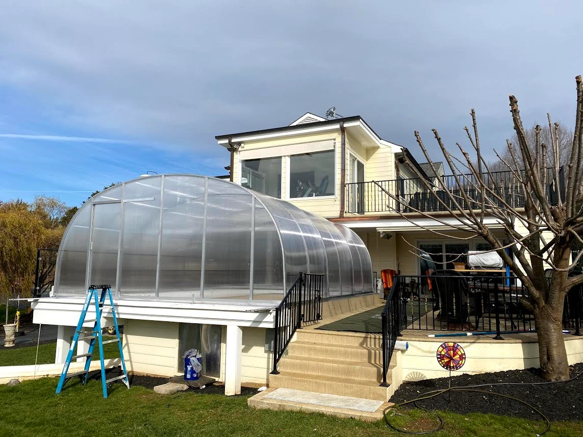 Pool with a Sunroom